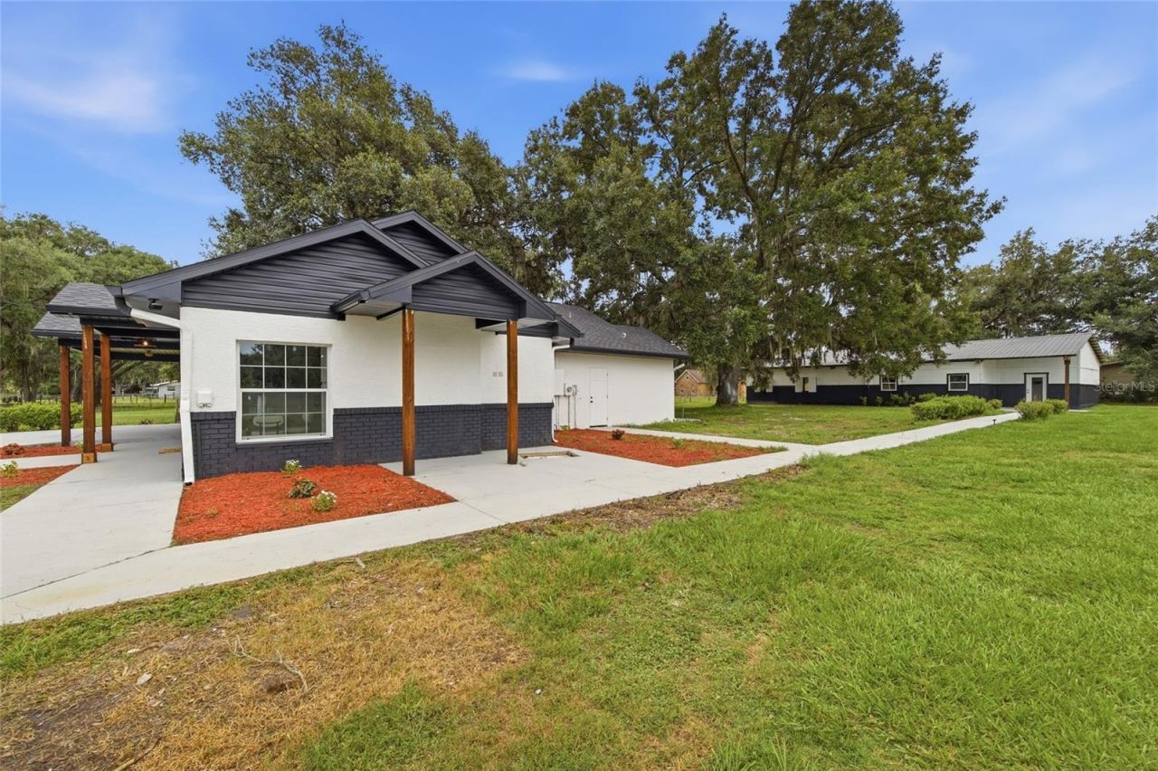 1205 E Knights Griffin Road , Plant City, FL 33565 Photo