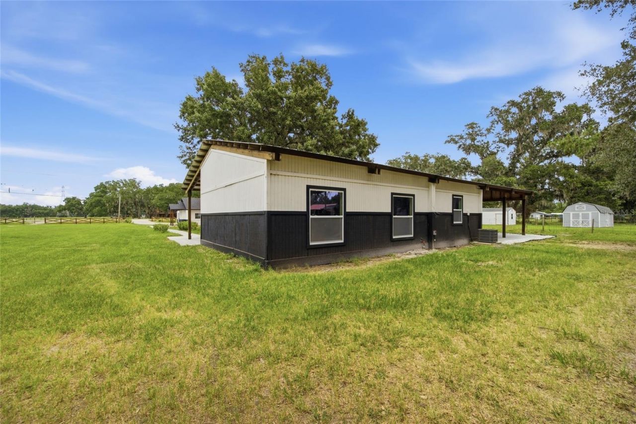 1205 E Knights Griffin Road , Plant City, FL 33565 Photo