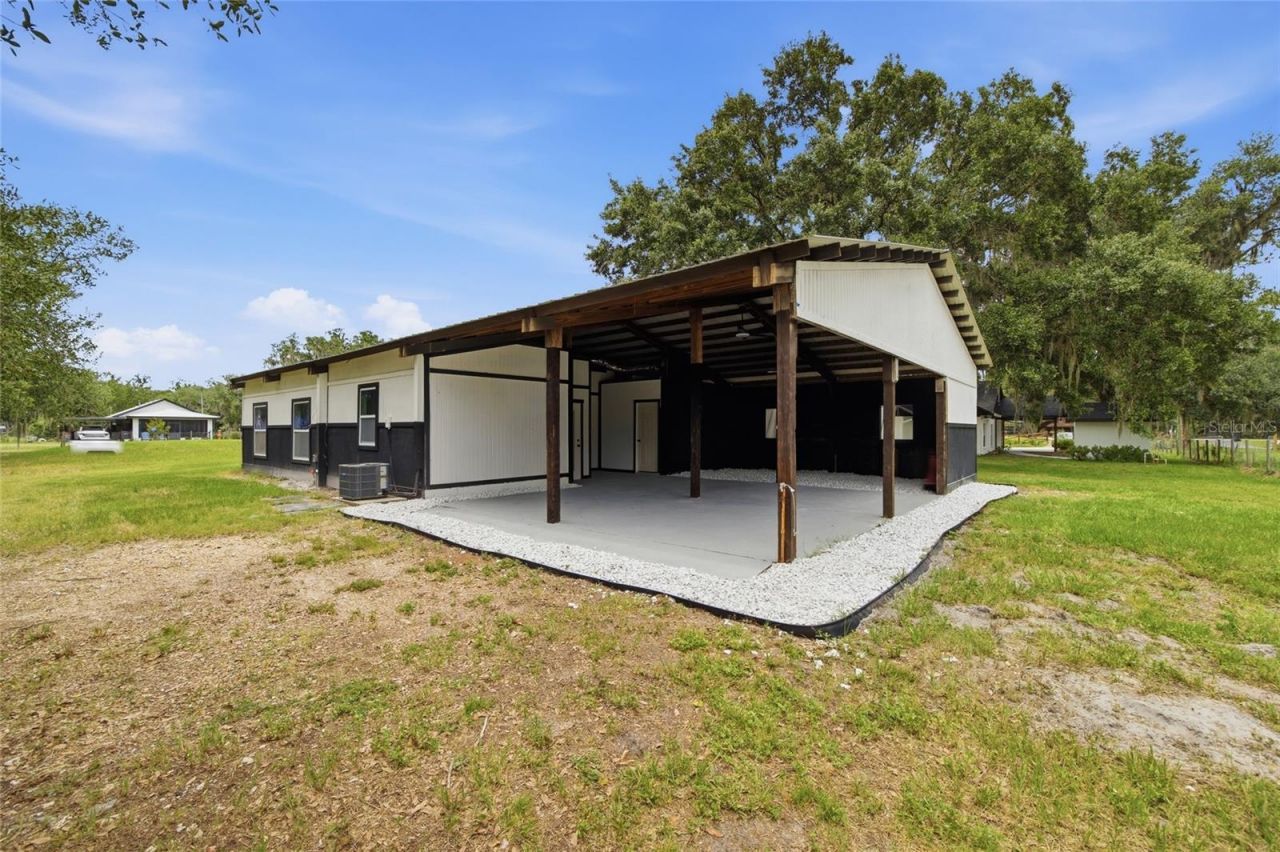1205 E Knights Griffin Road , Plant City, FL 33565 Photo