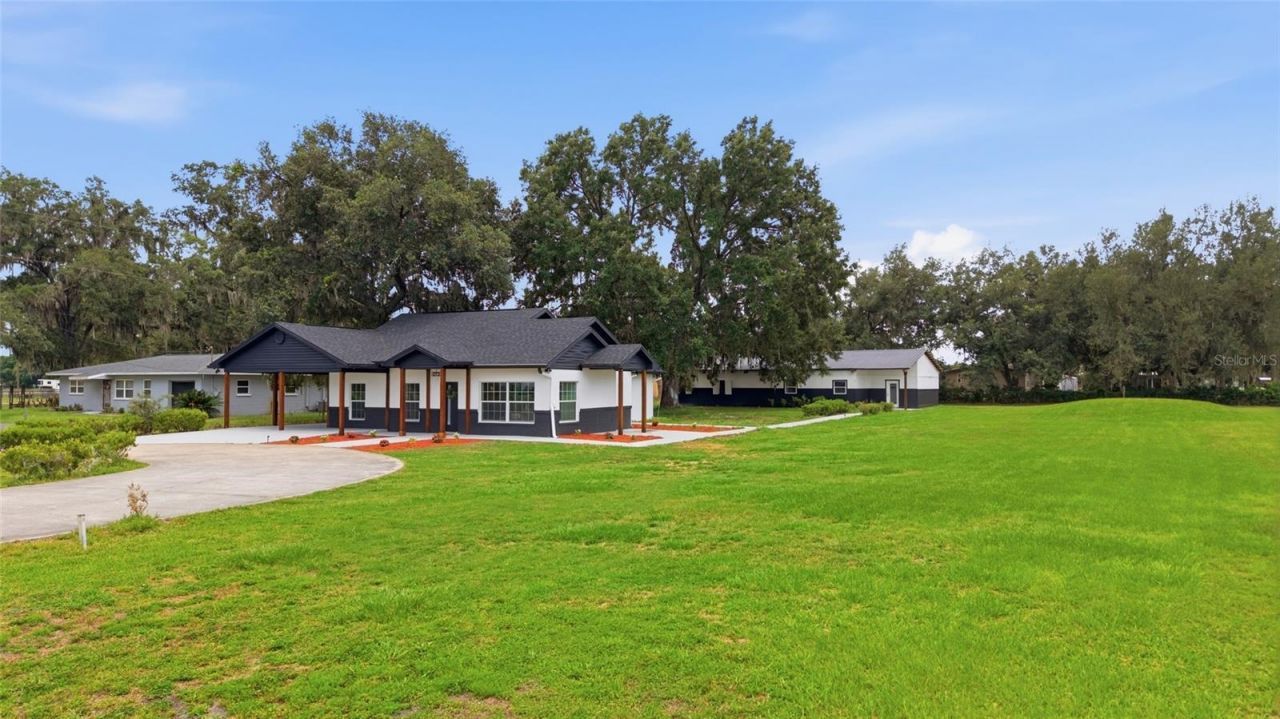 1205 E Knights Griffin Road , Plant City, FL 33565 Photo
