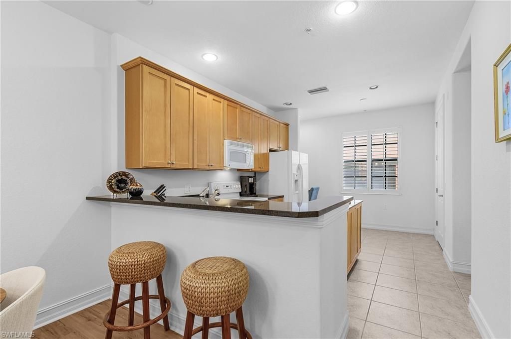 9118 Chula Vista St , Unit 12002, Naples, FL 34113 Photo