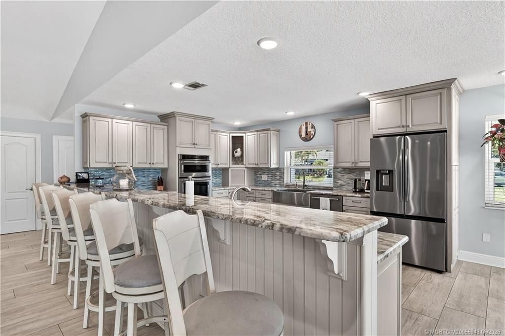 1007 SE Kitching Cove Lane, Port Saint Lucie, FL 34952 Photo