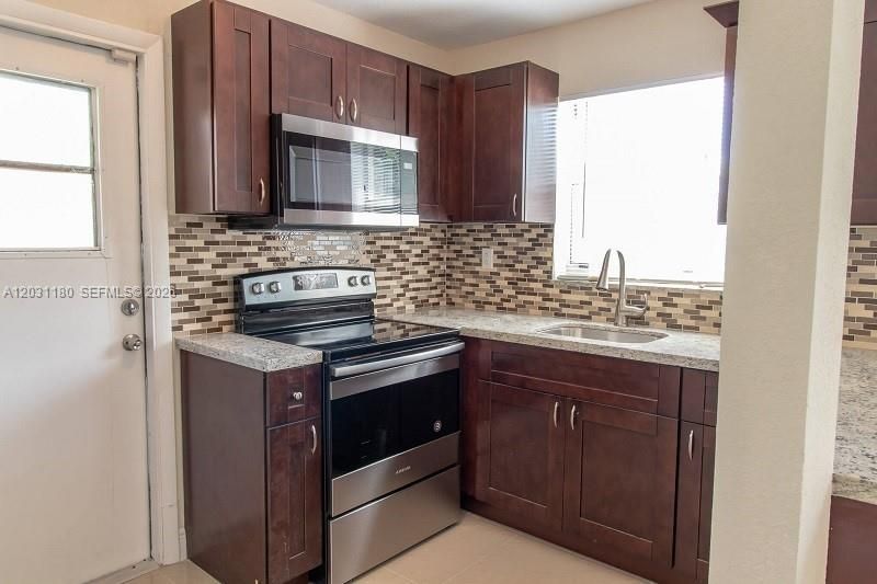 1861 NW 59th Way , Sunrise, FL 33313 Photo