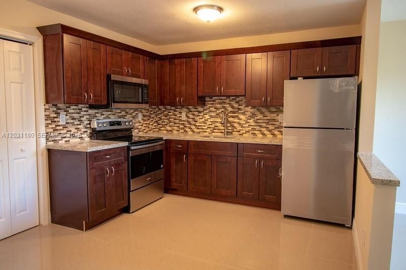 1861 NW 59th Way , Sunrise, FL 33313 Photo