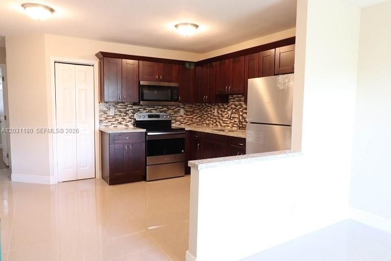 1861 NW 59th Way , Sunrise, FL 33313 Photo