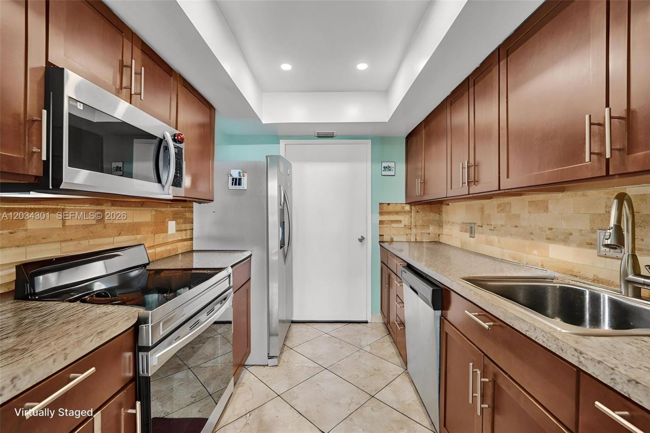 430 Golden Isles Dr , Unit 705, Hallandale Beach, FL 33009 Photo