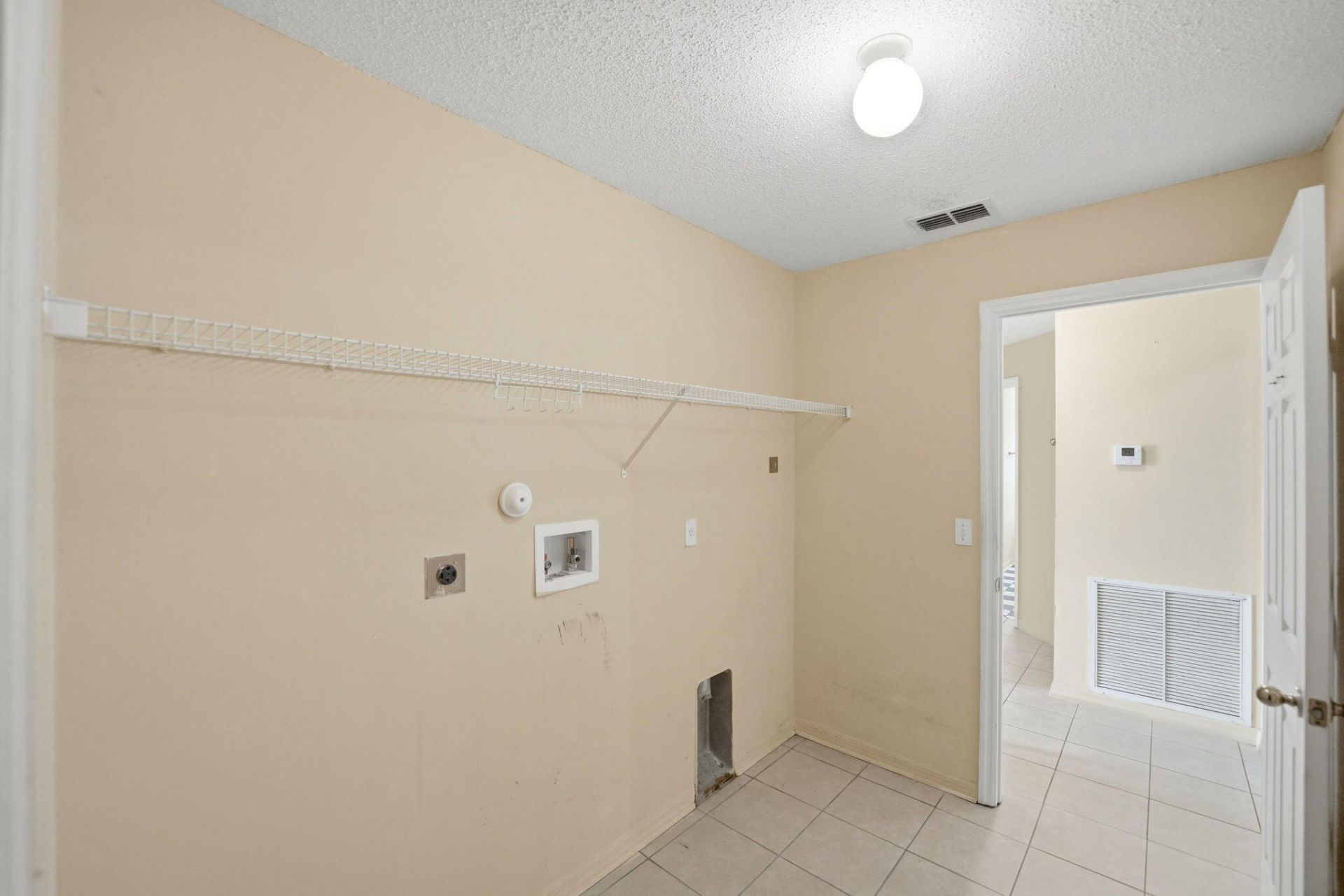 1692 SW Lofgren Avenue, Port Saint Lucie, FL 34953 Photo