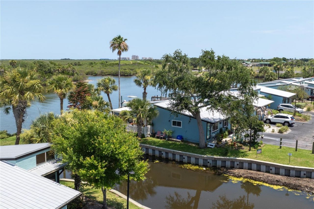 100 Poinciana Cove Court, Unit 100, New Smyrna Beach, FL 32169 Photo