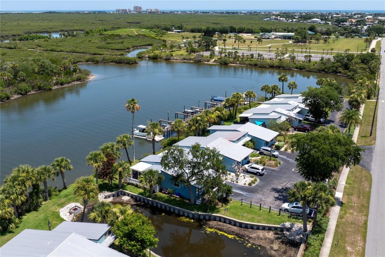 100 Poinciana Cove Court, Unit 100, New Smyrna Beach, FL 32169 Photo