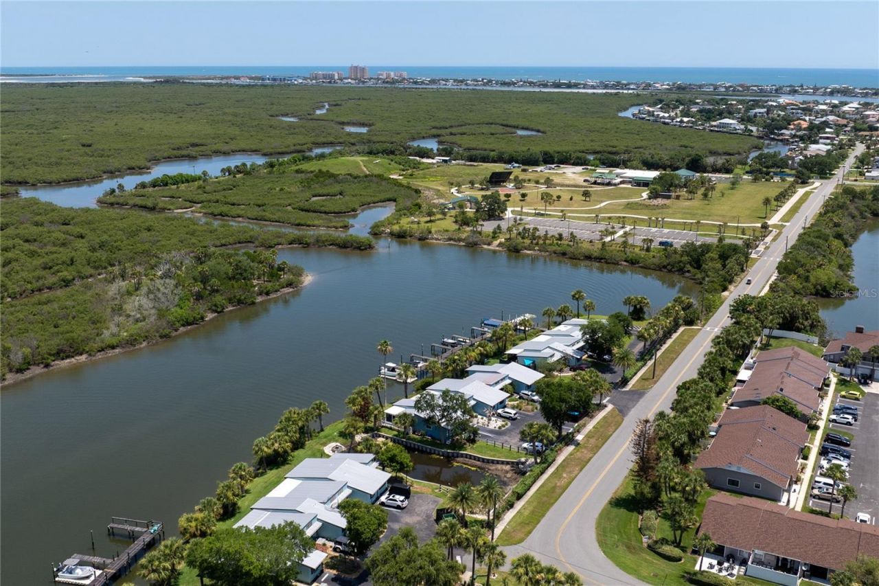 100 Poinciana Cove Court, Unit 100, New Smyrna Beach, FL 32169 Photo