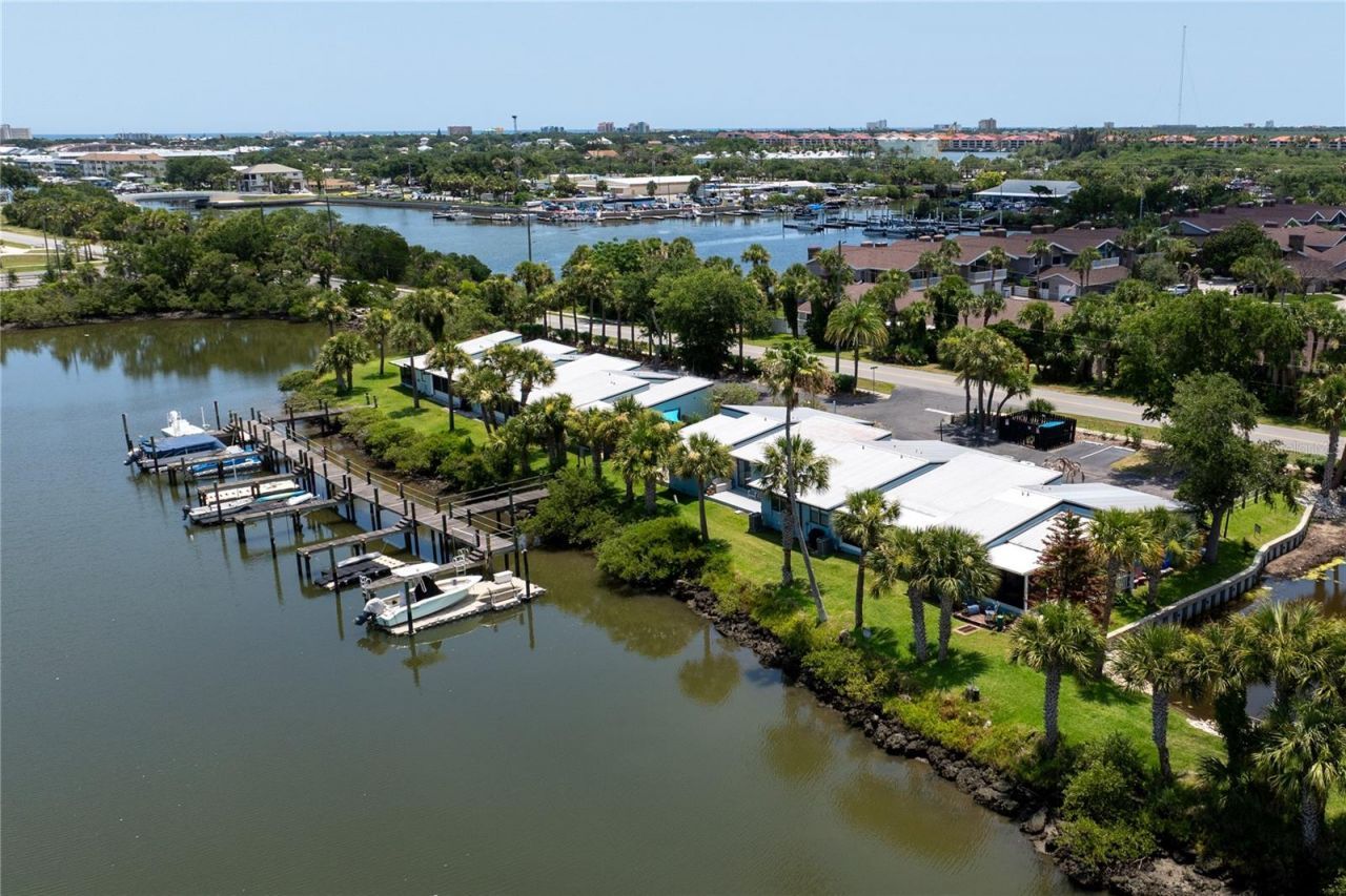 100 Poinciana Cove Court, Unit 100, New Smyrna Beach, FL 32169 Photo
