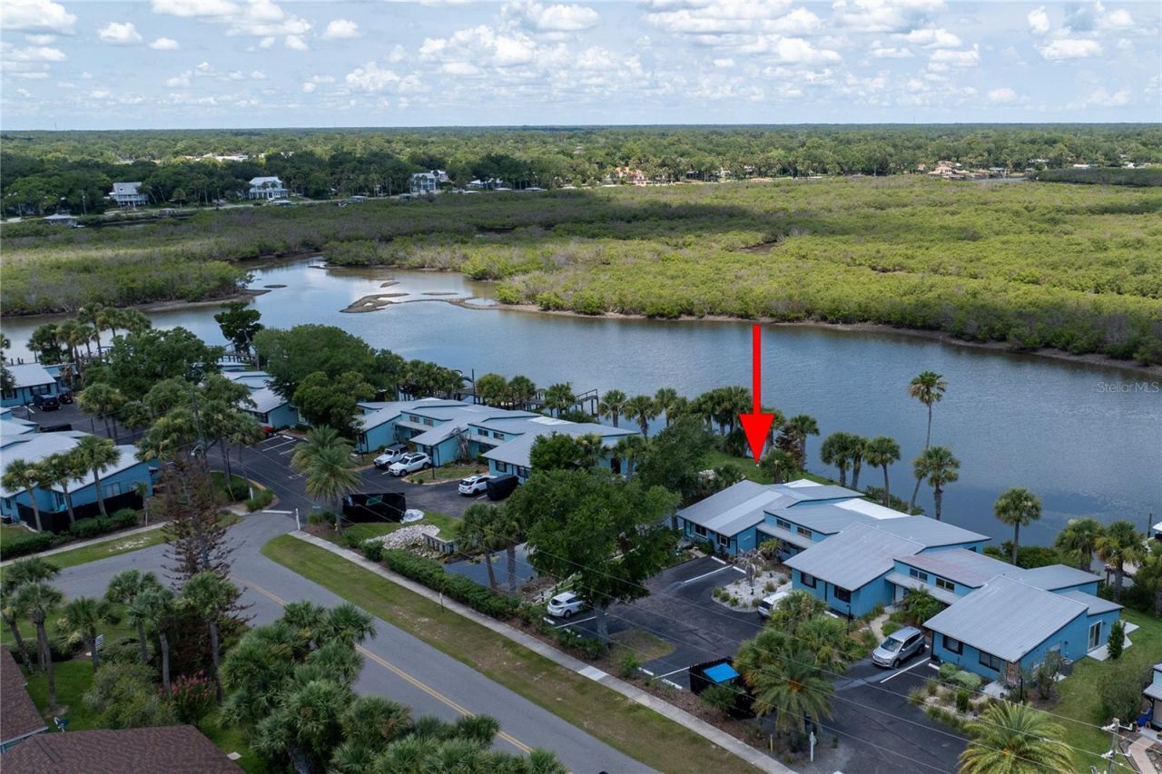 100 Poinciana Cove Court, Unit 100, New Smyrna Beach, FL 32169 Photo