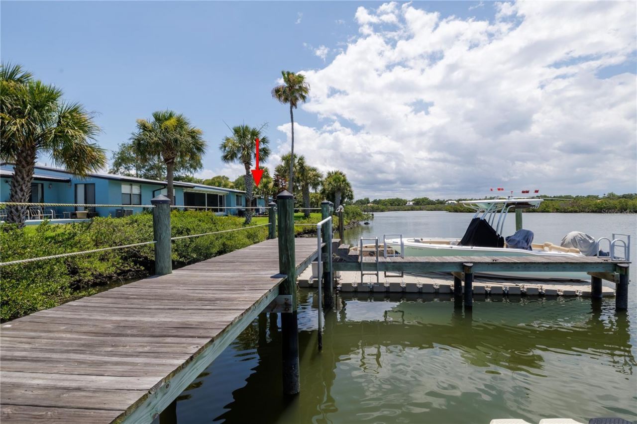 100 Poinciana Cove Court, Unit 100, New Smyrna Beach, FL 32169 Photo