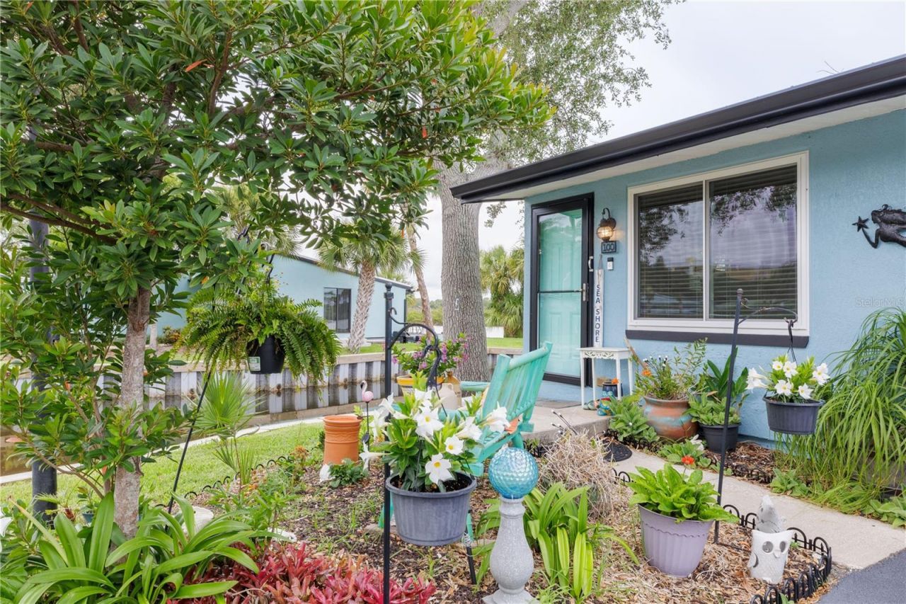 100 Poinciana Cove Court, Unit 100, New Smyrna Beach, FL 32169 Photo