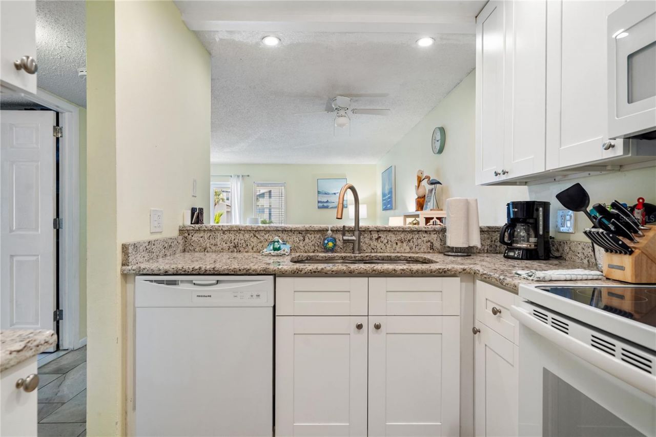 230 Medallion Boulevard , Unit E, Madeira Beach, FL 33708 Photo