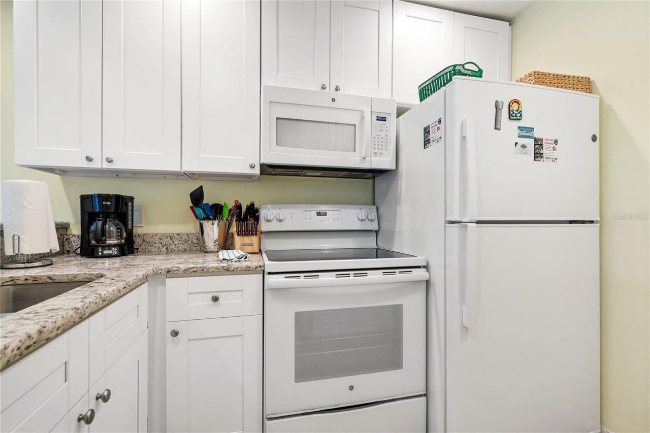 230 Medallion Boulevard , Unit E, Madeira Beach, FL 33708 Photo