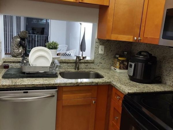 486 NW 165th St Rd, Unit B-103, Miami, FL 33169
