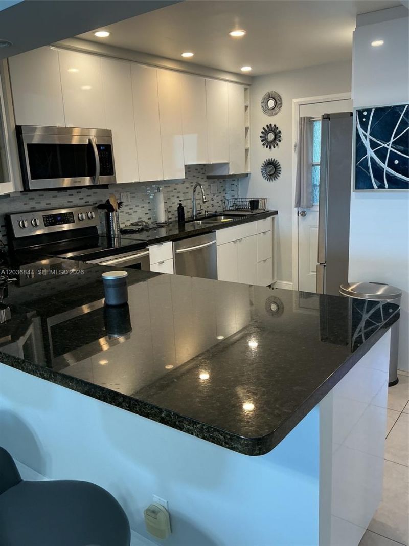 400 Golden Isles Dr, Unit 55, Hallandale Beach, FL 33009 Photo