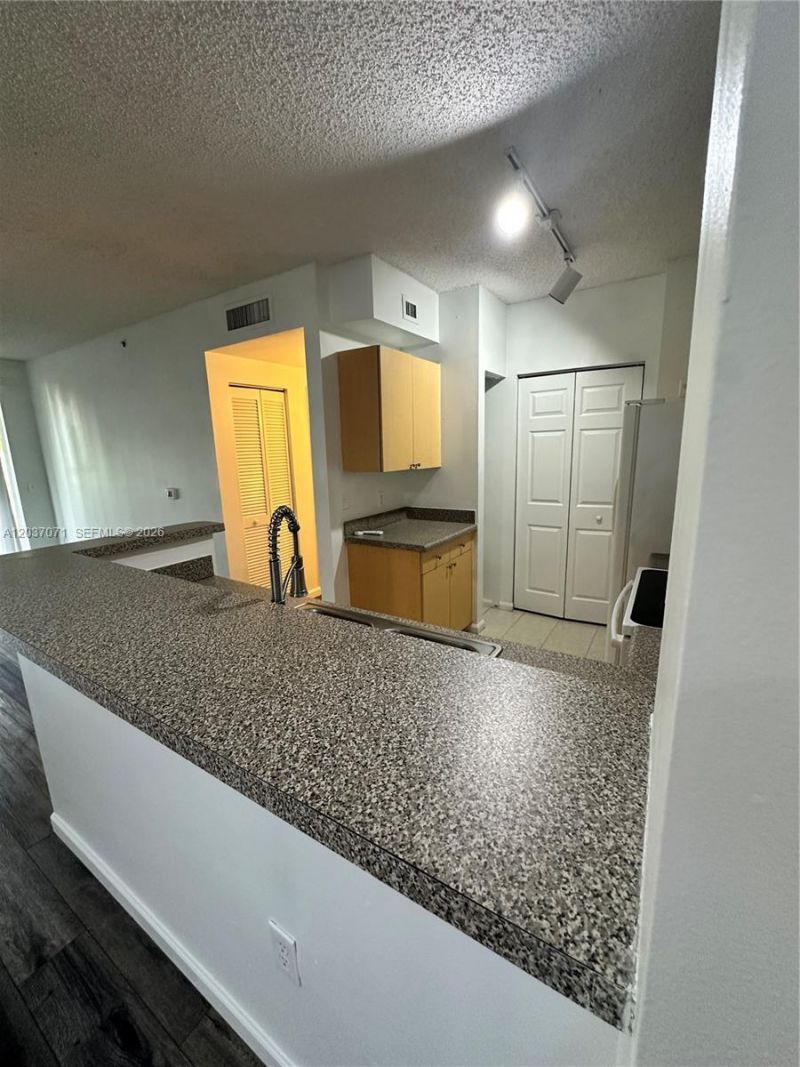 8050 N Nob Hill Rd, Unit 102, Tamarac, FL 33321 Photo