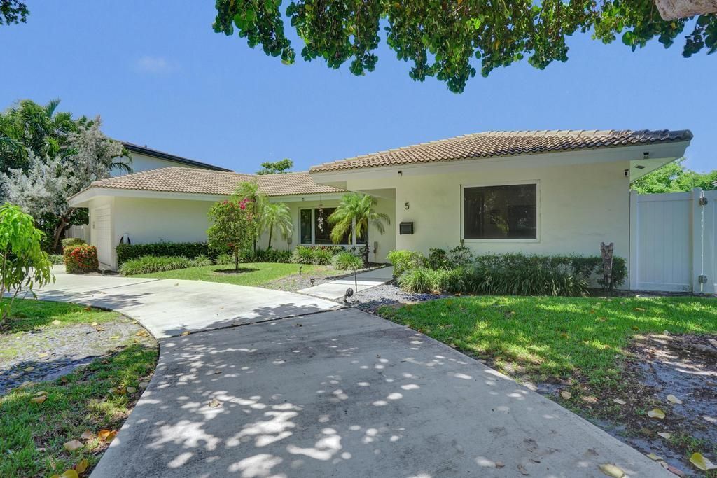 5 Gatehouse Road, Sea Ranch Lakes, FL 33308 Photo