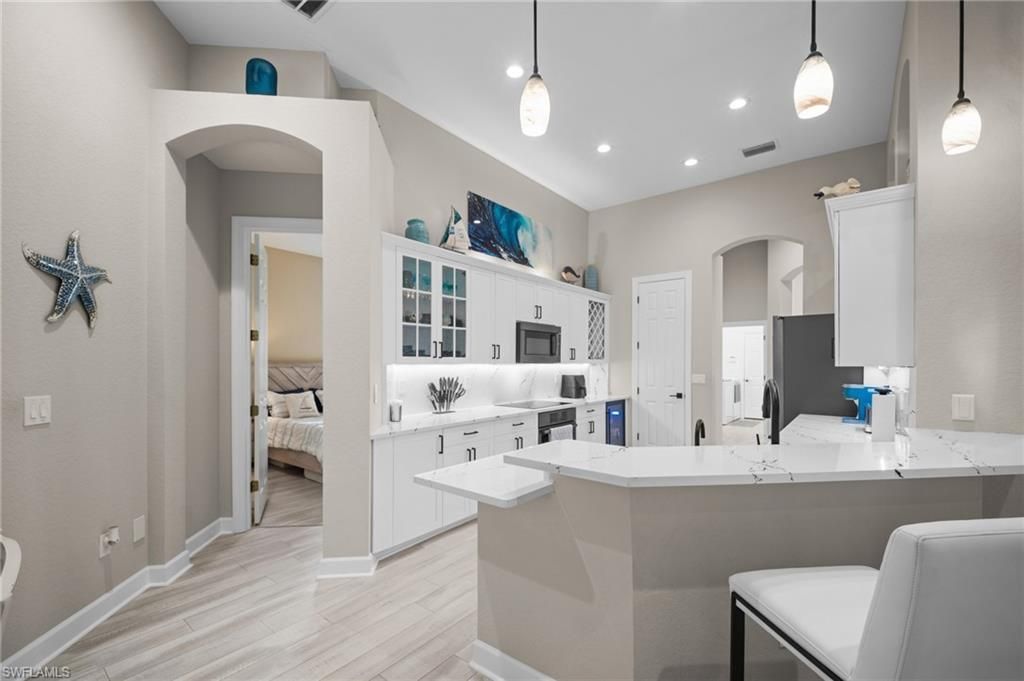9042 Bronco Ct , Naples, FL 34113 Photo