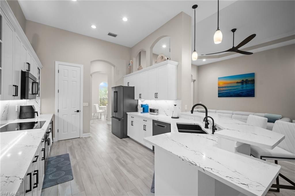 9042 Bronco Ct , Naples, FL 34113 Photo