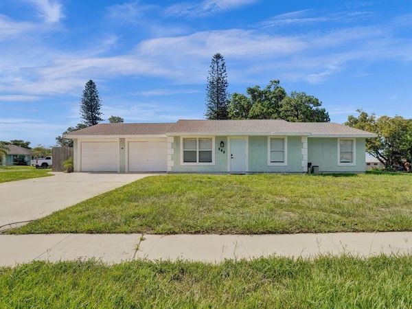 303 NE Solida Circle, Port St. Lucie, FL 34983