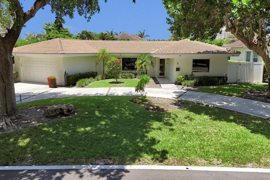 5 Gatehouse Road, Sea Ranch Lakes, FL 33308 Photo
