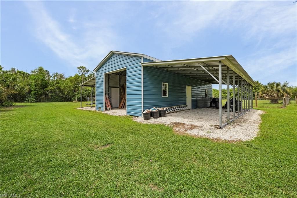 7697 Beach Daisy Ln , Bokeelia, FL 33922 Photo
