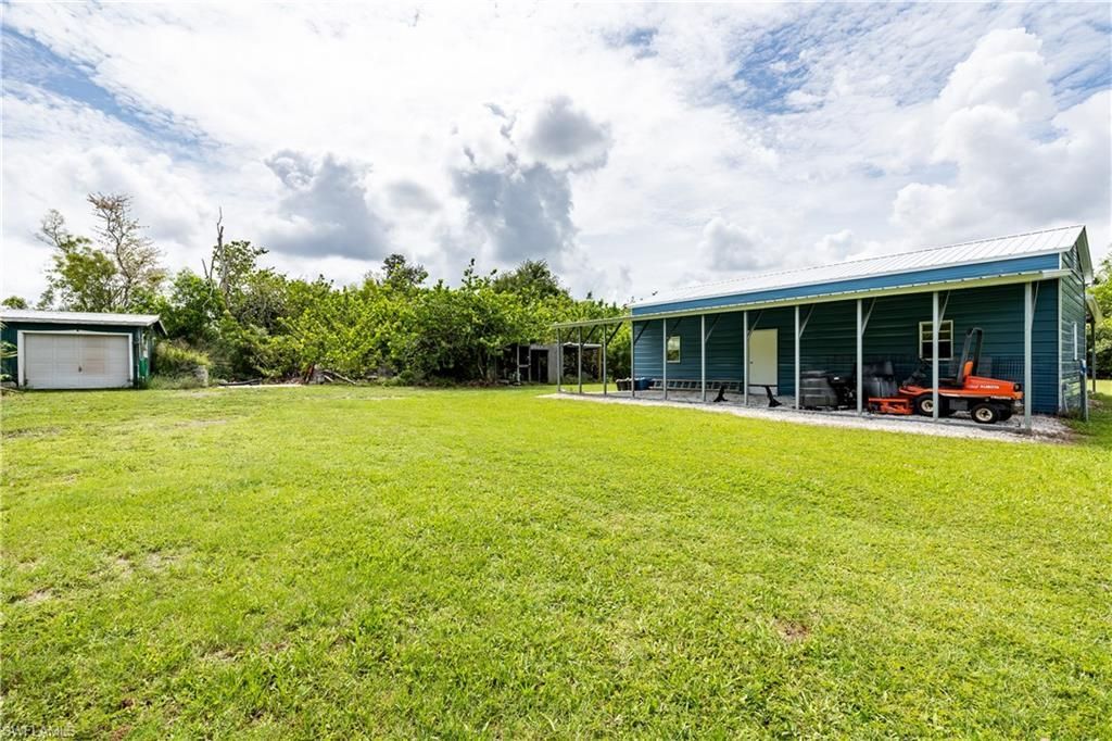 7697 Beach Daisy Ln , Bokeelia, FL 33922 Photo