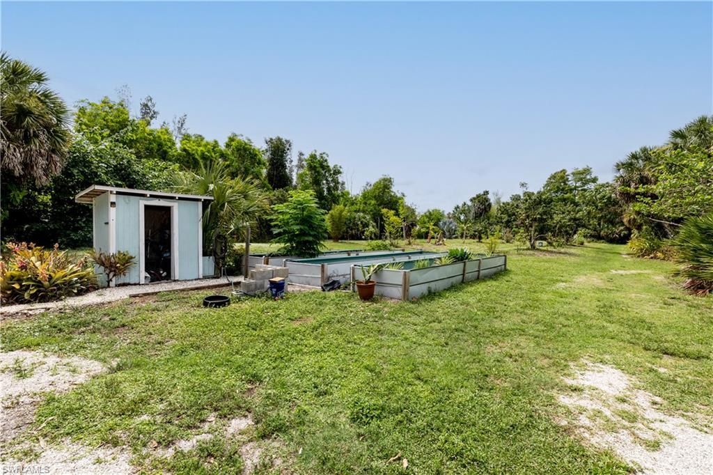 7697 Beach Daisy Ln , Bokeelia, FL 33922 Photo