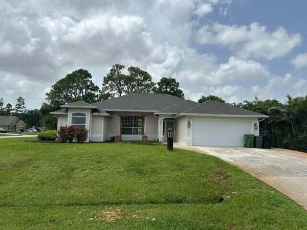102 NW Peach Street, Port St. Lucie, FL 34983