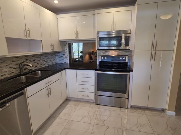 6090 N Sabal Palm Boulevard, Unit 209, Tamarac, FL 33319