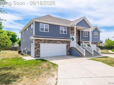 145 Whispering Pines Drive, Fenton, MI 48430