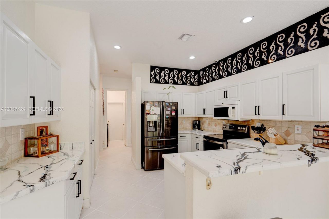 4964 NW 108th Ter, Coral Springs, FL 33076 Photo