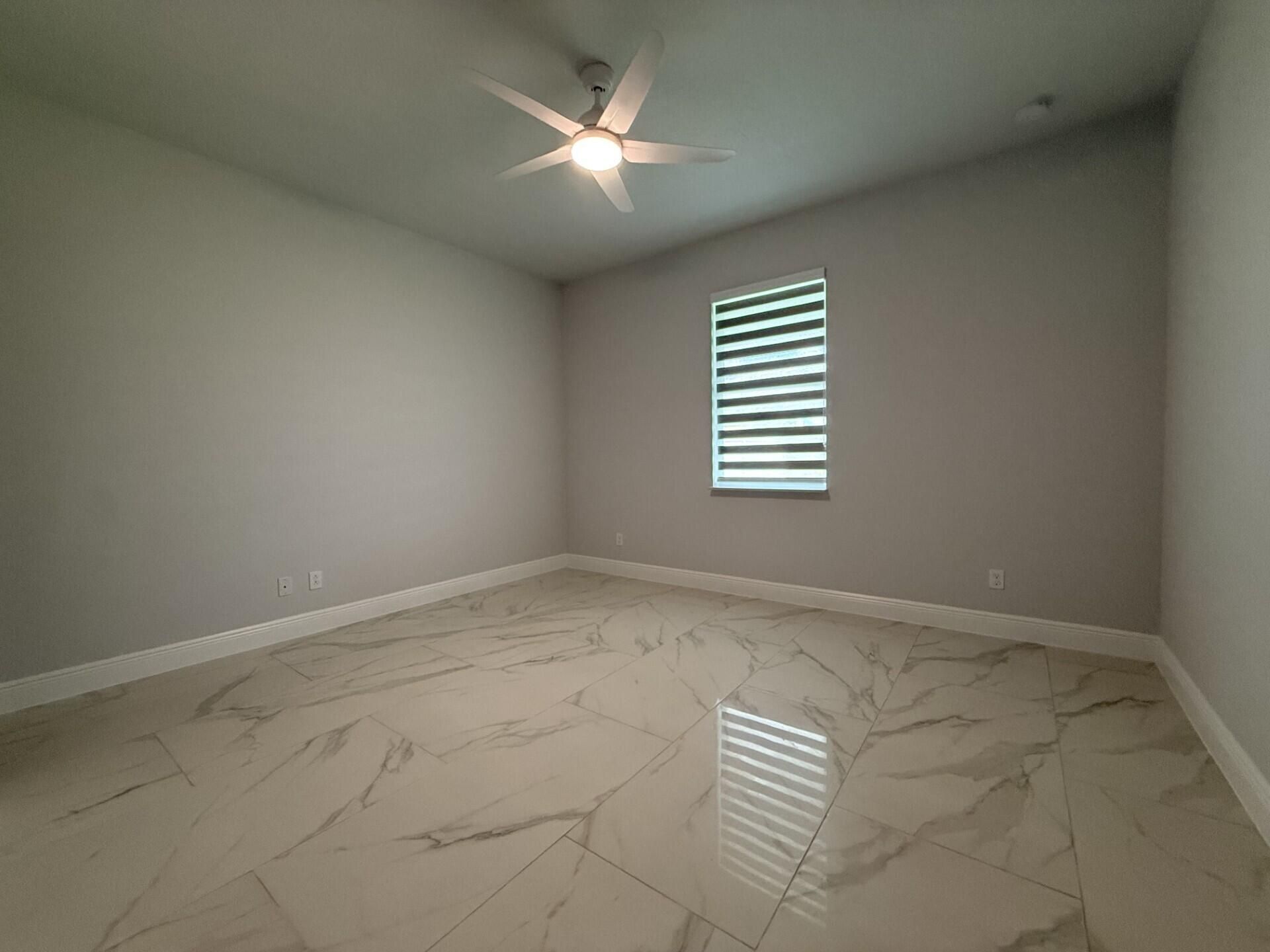 5673 NW Whitecap Road, Port Saint Lucie, FL 34986 Photo