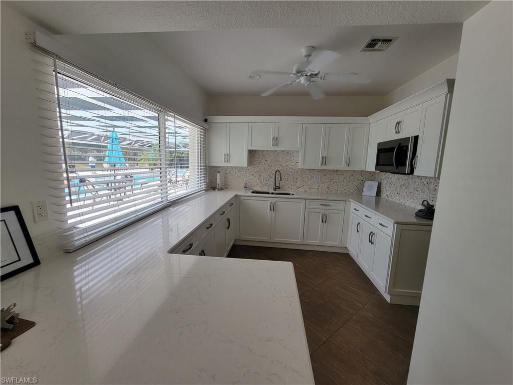 7577 Silver Trumpet Ln, Unit T-204, Naples, FL 34109 Photo