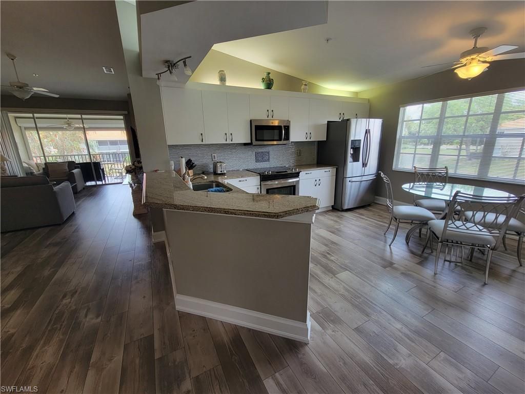 7577 Silver Trumpet Ln, Unit T-204, Naples, FL 34109 Photo