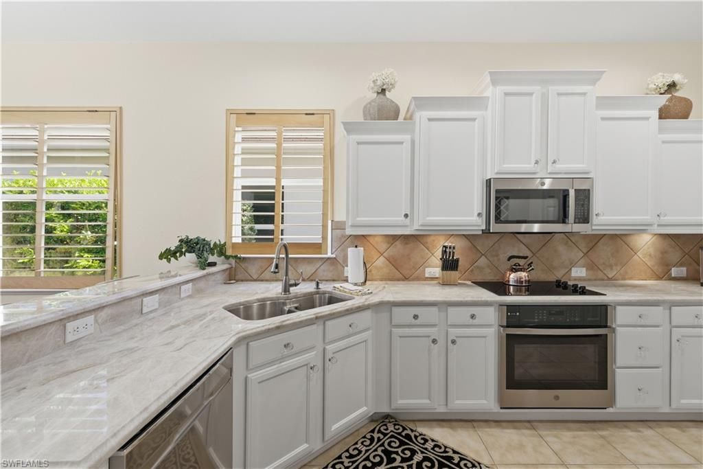 9235 Troon Lakes Dr, Naples, FL 34109 Photo