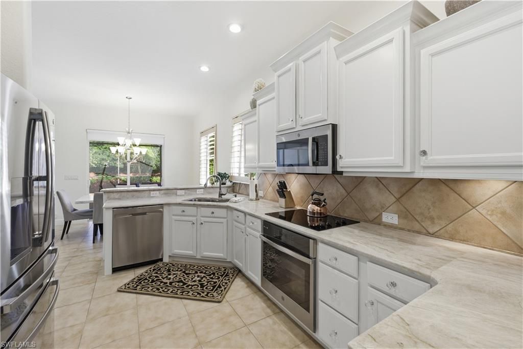 9235 Troon Lakes Dr, Naples, FL 34109 Photo