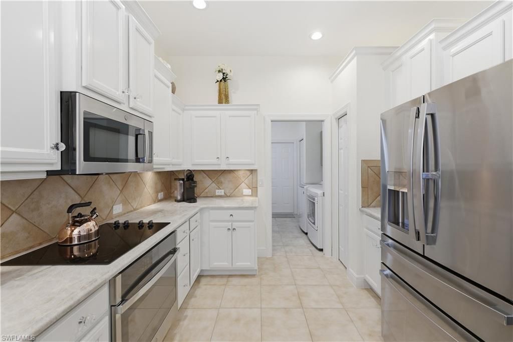 9235 Troon Lakes Dr, Naples, FL 34109 Photo