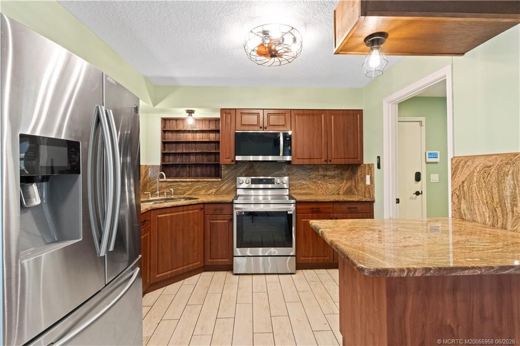 1028 NE Hansen Terrace, Jensen Beach, FL 34957 Photo