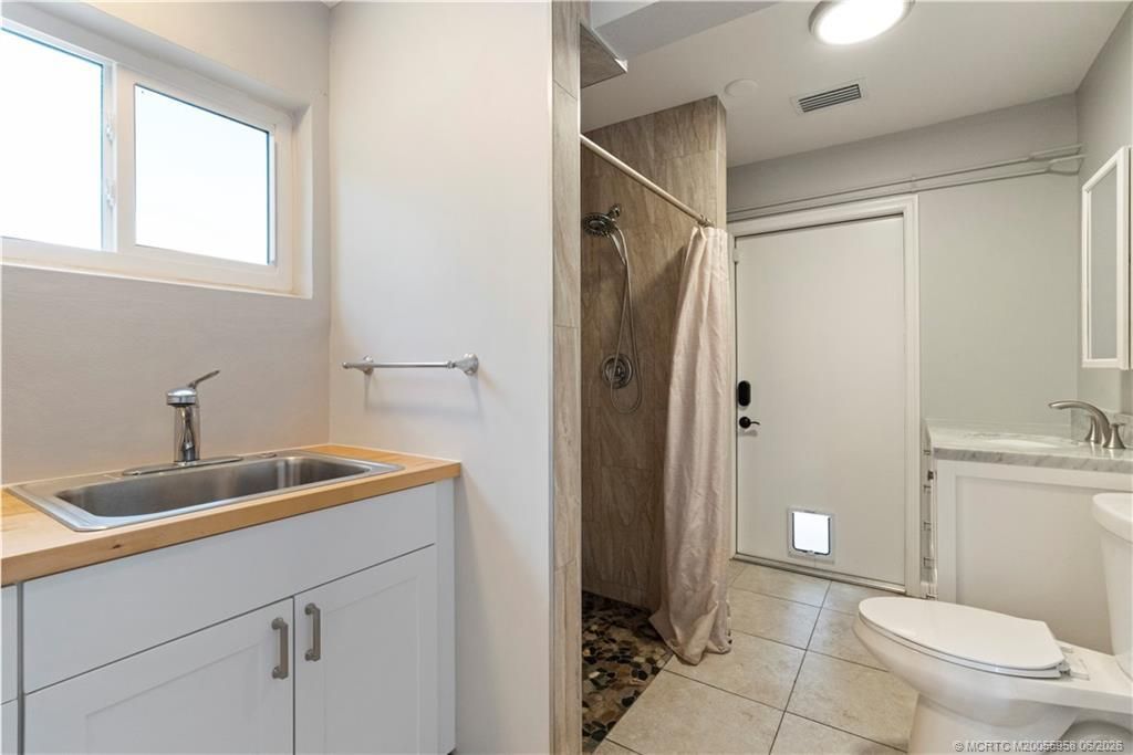 1028 NE Hansen Terrace, Jensen Beach, FL 34957 Photo