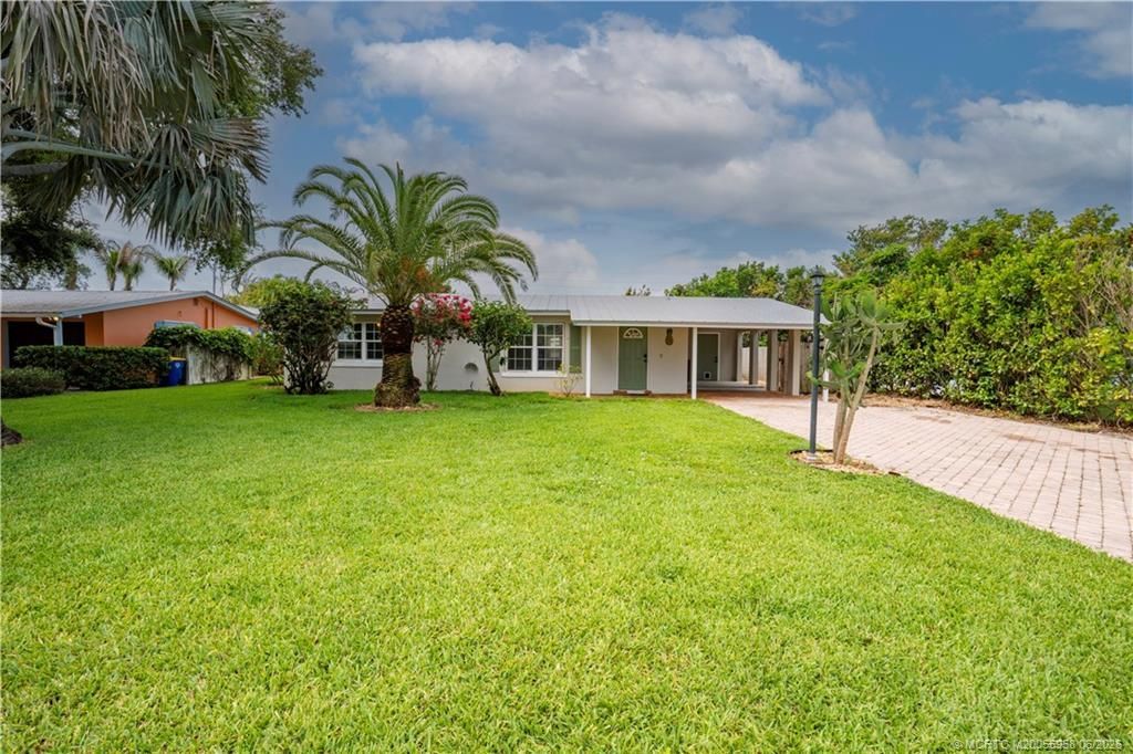 1028 NE Hansen Terrace, Jensen Beach, FL 34957 Photo