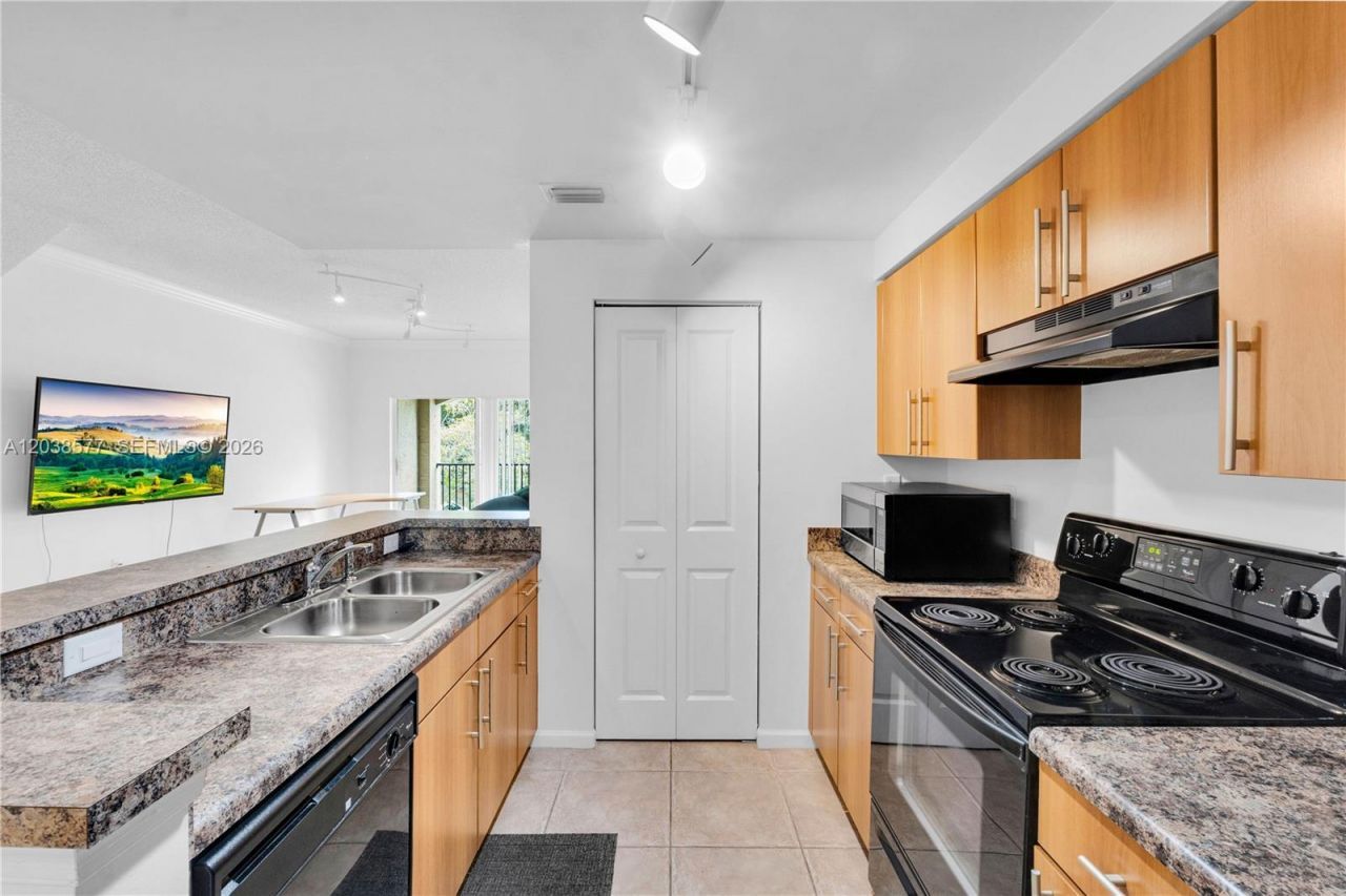 5880 W Sample Rd , Unit 203, Coral Springs, FL 33067 Photo