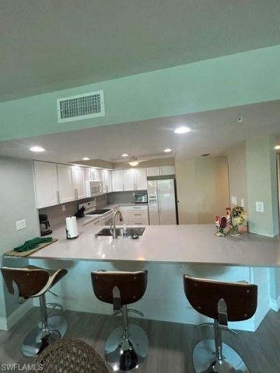 21 Bluebill Ave, Unit 303, Naples, FL 34108 Photo