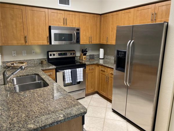 6400 Emerald Dunes Dr #303, West Palm Beach, FL 33411
