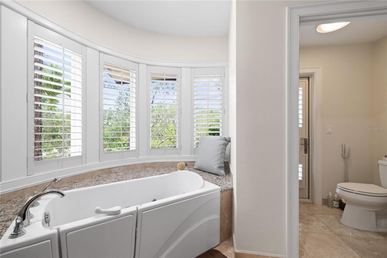 6305 Burning Tree Drive, Seminole, FL 33777 Photo