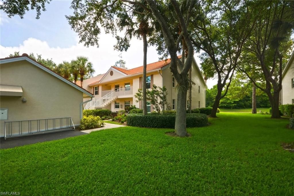 193 Robin Hood Cir, Unit 203, Naples, FL 34104 Main Photo