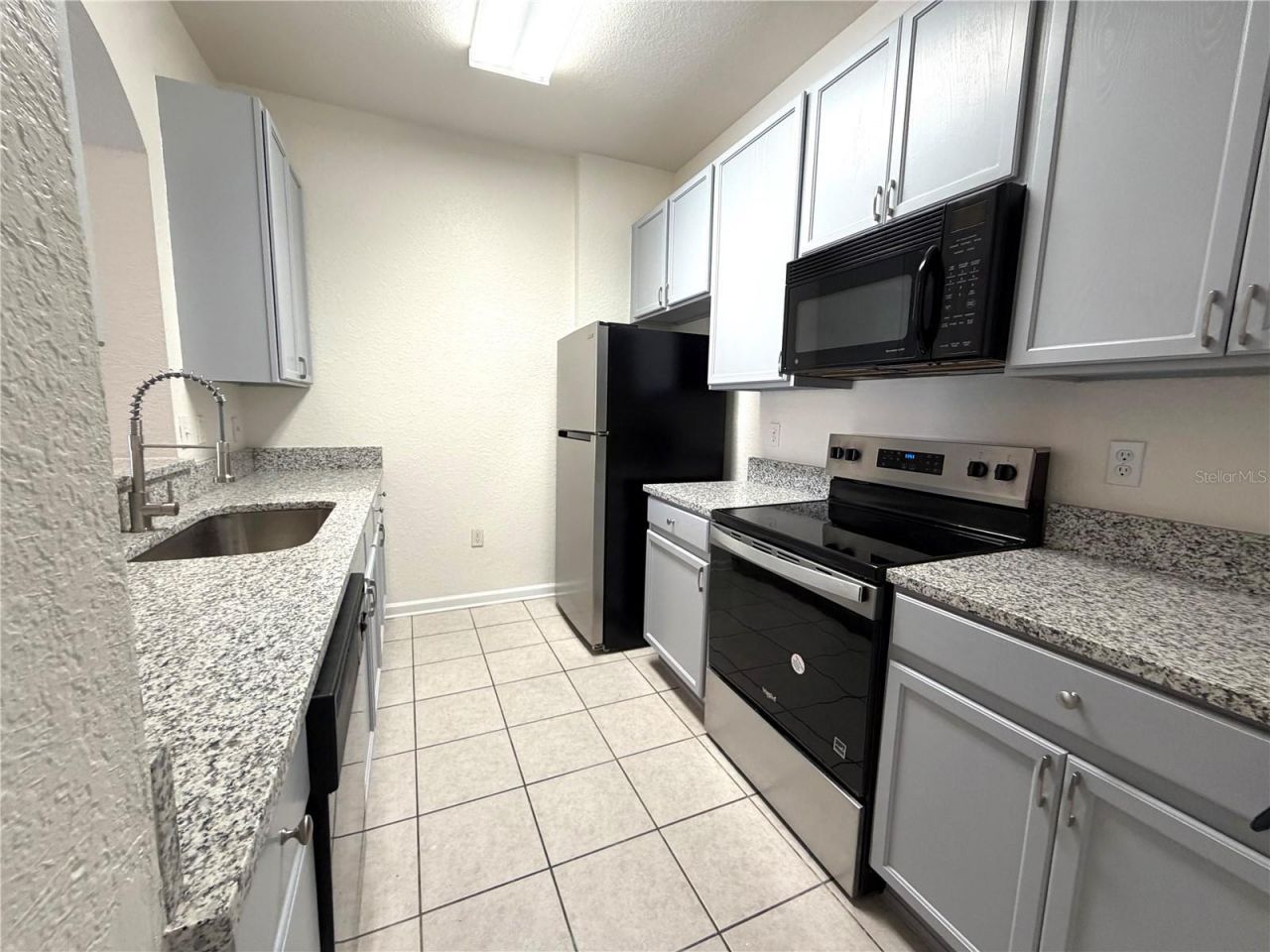 6335 Contessa Drive , Unit 201, Orlando, FL 32829 Photo